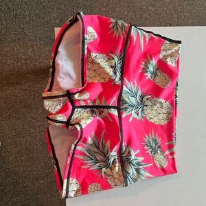 Pink pineapple print athletic shorts